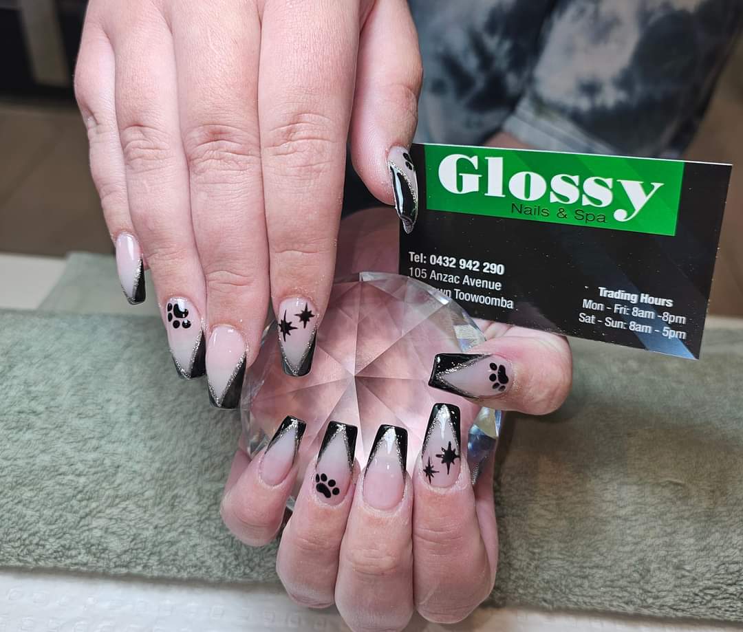 Black French tips with paw print nail art